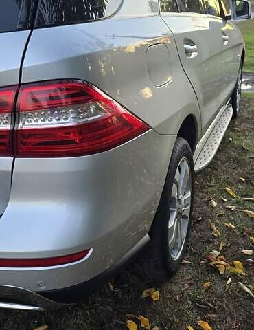 Сірий Мерседес М-Клас, об'ємом двигуна 2.14 л та пробігом 217 тис. км за 19000 $, фото 11 на Automoto.ua