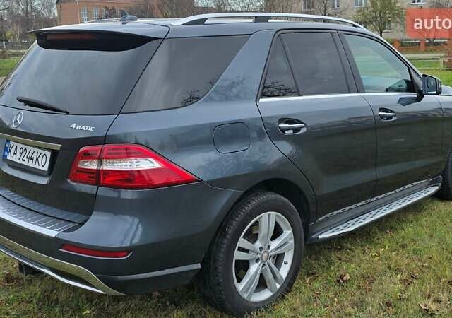 Сірий Мерседес М-Клас, об'ємом двигуна 3.5 л та пробігом 195 тис. км за 17000 $, фото 3 на Automoto.ua