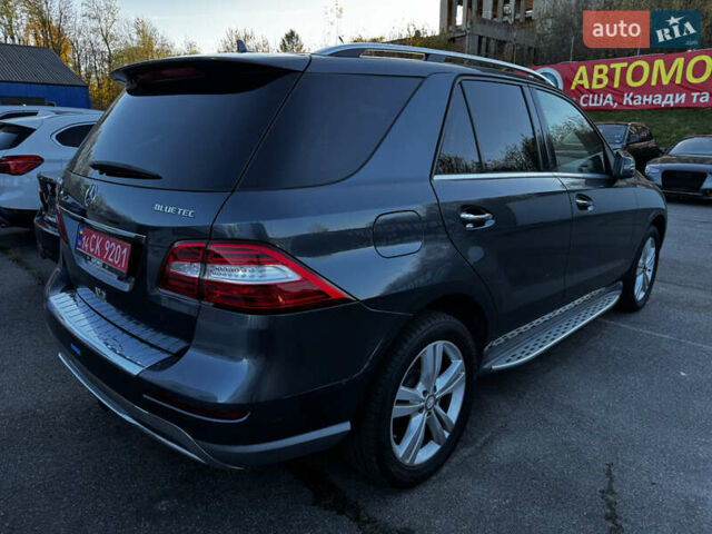 Сірий Мерседес М-Клас, об'ємом двигуна 3 л та пробігом 220 тис. км за 13900 $, фото 2 на Automoto.ua