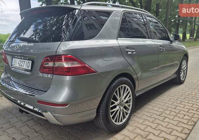 Серый Мерседес М-Класс, объемом двигателя 2.99 л и пробегом 103 тыс. км за 31000 $, фото 2 на Automoto.ua