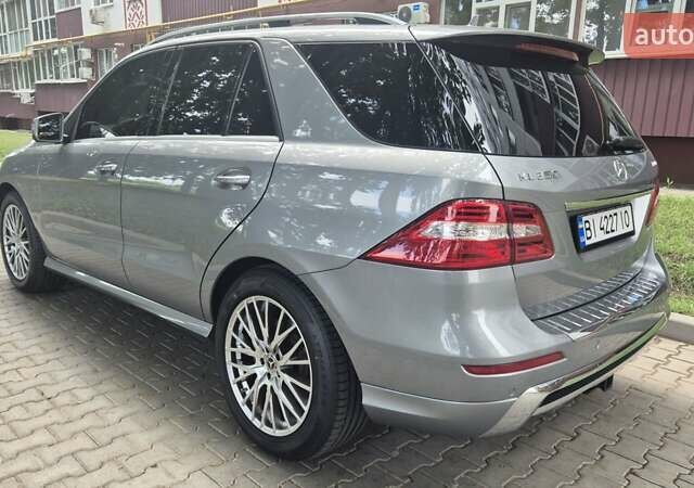 Серый Мерседес М-Класс, объемом двигателя 2.99 л и пробегом 103 тыс. км за 31000 $, фото 5 на Automoto.ua