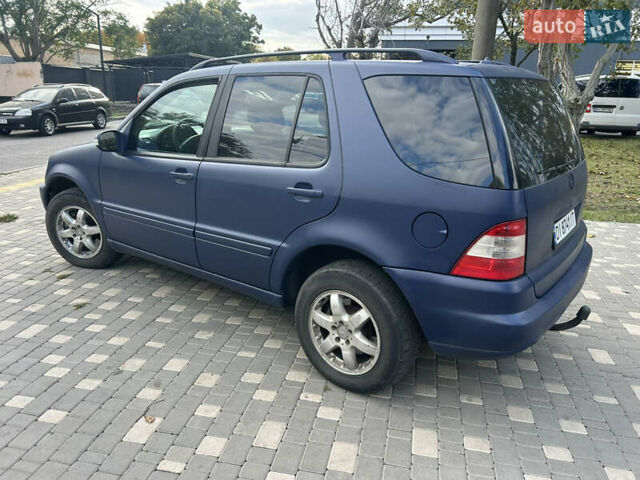 Синій Мерседес М-Клас, об'ємом двигуна 4 л та пробігом 370 тис. км за 5200 $, фото 4 на Automoto.ua