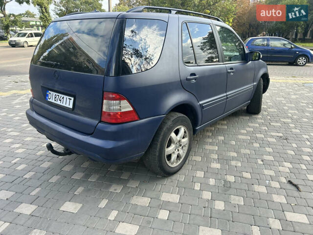 Синій Мерседес М-Клас, об'ємом двигуна 4 л та пробігом 370 тис. км за 5200 $, фото 3 на Automoto.ua