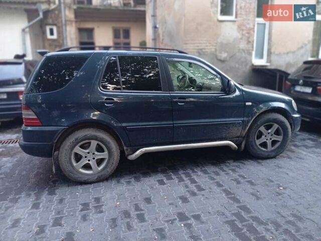 Синій Мерседес М-Клас, об'ємом двигуна 2.69 л та пробігом 300 тис. км за 8500 $, фото 3 на Automoto.ua
