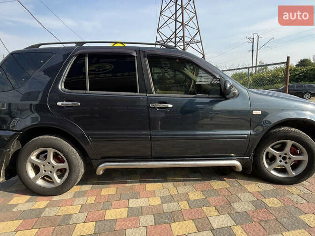 Синий Мерседес М-Класс, объемом двигателя 3.2 л и пробегом 302 тыс. км за 7600 $, фото 7 на Automoto.ua