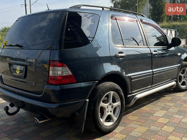 Синий Мерседес М-Класс, объемом двигателя 3.2 л и пробегом 302 тыс. км за 7600 $, фото 6 на Automoto.ua