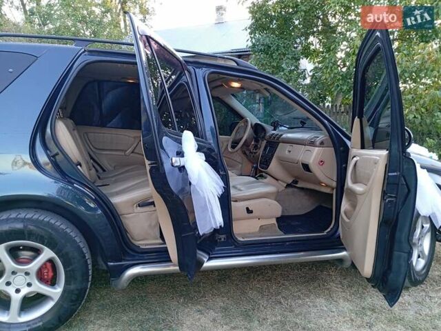 Синій Мерседес М-Клас, об'ємом двигуна 3.2 л та пробігом 302 тис. км за 8000 $, фото 5 на Automoto.ua