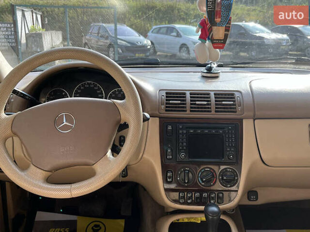 Синий Мерседес М-Класс, объемом двигателя 3.2 л и пробегом 302 тыс. км за 7600 $, фото 14 на Automoto.ua