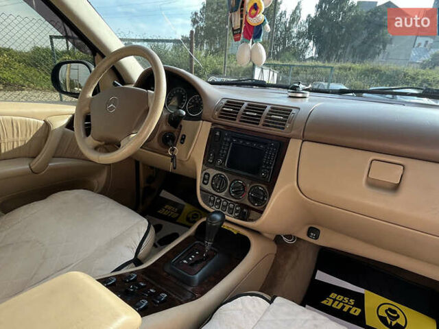 Синий Мерседес М-Класс, объемом двигателя 3.2 л и пробегом 302 тыс. км за 7600 $, фото 15 на Automoto.ua