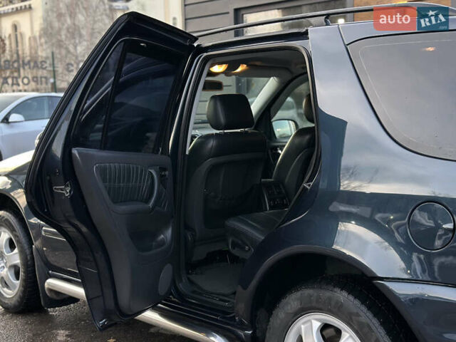 Синий Мерседес М-Класс, объемом двигателя 3.19 л и пробегом 324 тыс. км за 8400 $, фото 38 на Automoto.ua