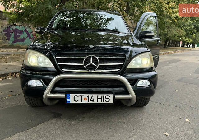 Синий Мерседес М-Класс, объемом двигателя 4 л и пробегом 240 тыс. км за 5150 $, фото 50 на Automoto.ua