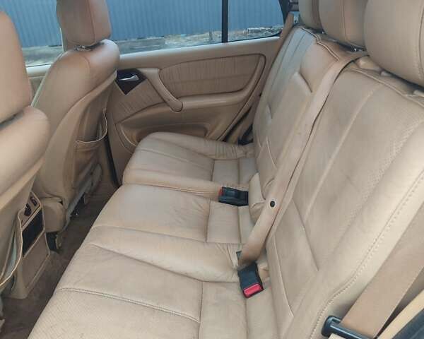 Синій Мерседес М-Клас, об'ємом двигуна 2.69 л та пробігом 219 тис. км за 5999 $, фото 7 на Automoto.ua