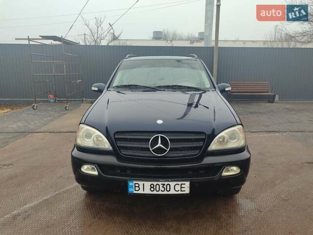 Синій Мерседес М-Клас, об'ємом двигуна 2.69 л та пробігом 219 тис. км за 5999 $, фото 1 на Automoto.ua