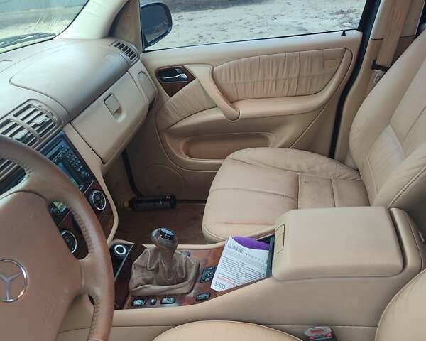 Синій Мерседес М-Клас, об'ємом двигуна 2.69 л та пробігом 219 тис. км за 5999 $, фото 8 на Automoto.ua