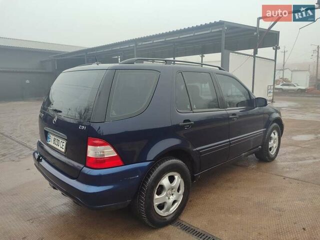 Синій Мерседес М-Клас, об'ємом двигуна 2.69 л та пробігом 219 тис. км за 5999 $, фото 4 на Automoto.ua