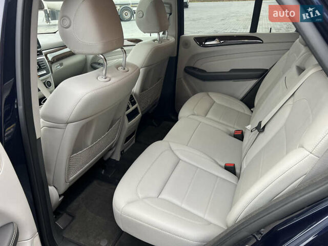 Синій Мерседес М-Клас, об'ємом двигуна 3 л та пробігом 166 тис. км за 30900 $, фото 49 на Automoto.ua