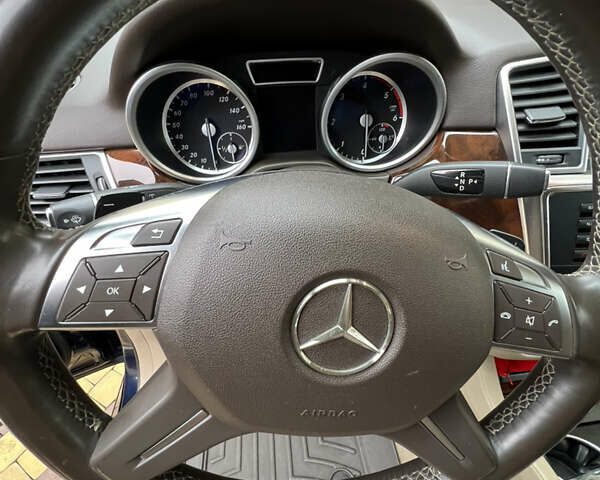 Синій Мерседес М-Клас, об'ємом двигуна 2.14 л та пробігом 130 тис. км за 26500 $, фото 19 на Automoto.ua