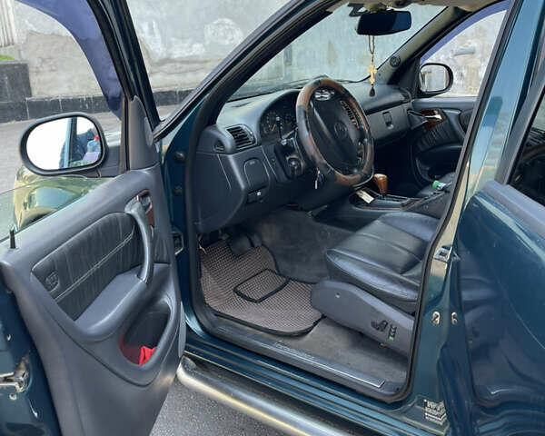 Зеленый Мерседес М-Класс, объемом двигателя 3.2 л и пробегом 253 тыс. км за 4000 $, фото 5 на Automoto.ua