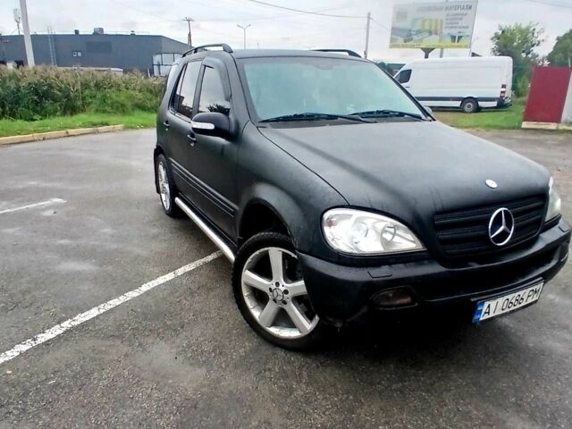 Чорний Мерседес МЛ 320, об'ємом двигуна 3.2 л та пробігом 400 тис. км за 5800 $, фото 1 на Automoto.ua