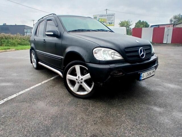 Чорний Мерседес МЛ 320, об'ємом двигуна 3.2 л та пробігом 400 тис. км за 5800 $, фото 8 на Automoto.ua
