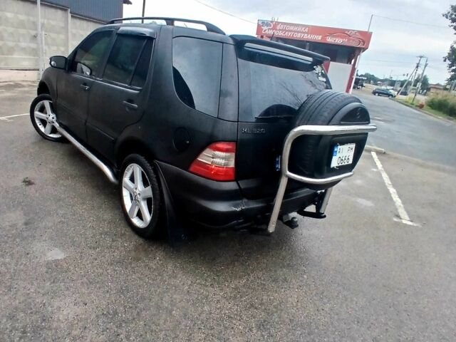 Чорний Мерседес МЛ 320, об'ємом двигуна 3.2 л та пробігом 400 тис. км за 5800 $, фото 7 на Automoto.ua