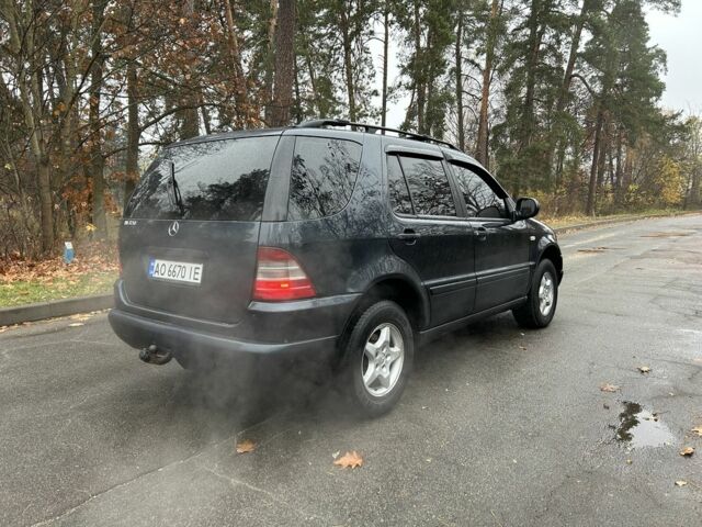 Синій Мерседес МЛ 320, об'ємом двигуна 3.2 л та пробігом 280 тис. км за 5499 $, фото 2 на Automoto.ua