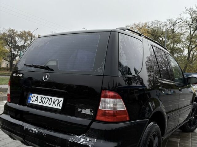 Черный Мерседес МЛ 350, объемом двигателя 3.5 л и пробегом 230 тыс. км за 6700 $, фото 2 на Automoto.ua