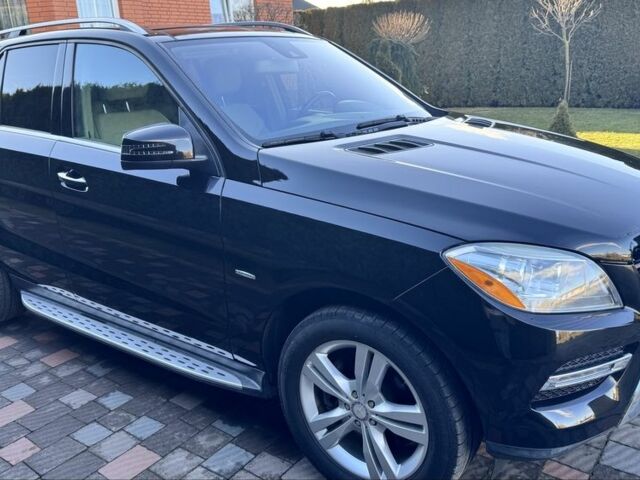 Чорний Мерседес МЛ 350, об'ємом двигуна 3 л та пробігом 184 тис. км за 18900 $, фото 1 на Automoto.ua