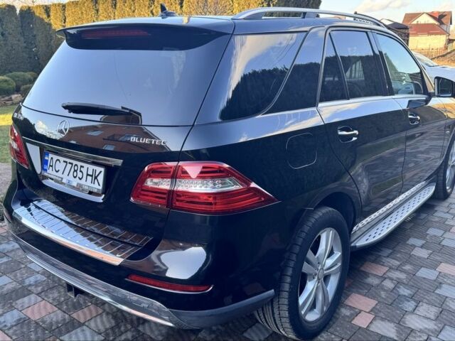 Чорний Мерседес МЛ 350, об'ємом двигуна 3 л та пробігом 184 тис. км за 18900 $, фото 2 на Automoto.ua