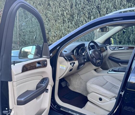 Чорний Мерседес МЛ 350, об'ємом двигуна 3 л та пробігом 184 тис. км за 18900 $, фото 6 на Automoto.ua