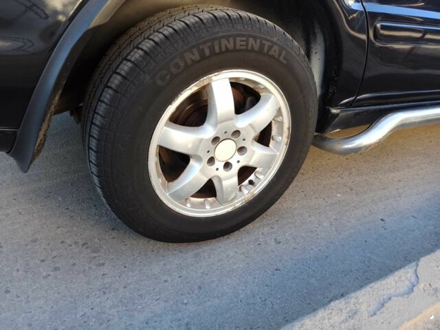 Черный Мерседес МЛ 350, объемом двигателя 3.7 л и пробегом 350 тыс. км за 5950 $, фото 7 на Automoto.ua