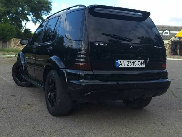 Черный Мерседес МЛ 350, объемом двигателя 3.7 л и пробегом 325 тыс. км за 5555 $, фото 5 на Automoto.ua