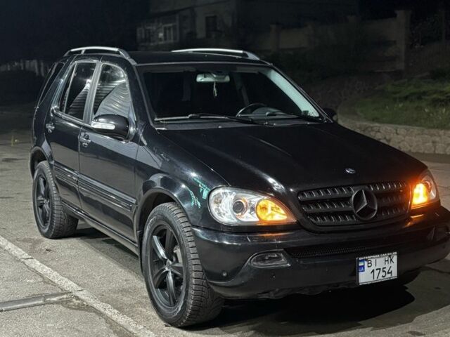 Черный Мерседес МЛ 350, объемом двигателя 3.7 л и пробегом 270 тыс. км за 8999 $, фото 3 на Automoto.ua