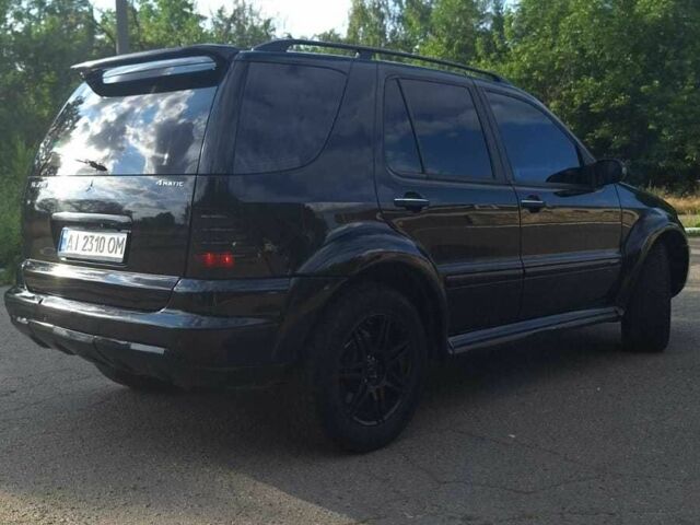 Черный Мерседес МЛ 350, объемом двигателя 3.7 л и пробегом 325 тыс. км за 5555 $, фото 8 на Automoto.ua