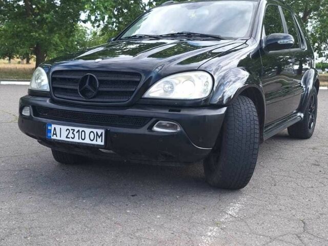 Черный Мерседес МЛ 350, объемом двигателя 3.7 л и пробегом 325 тыс. км за 5555 $, фото 4 на Automoto.ua