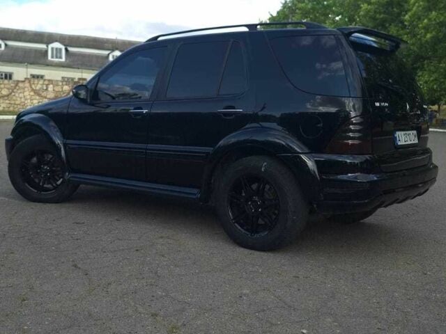 Черный Мерседес МЛ 350, объемом двигателя 3.7 л и пробегом 325 тыс. км за 5555 $, фото 6 на Automoto.ua