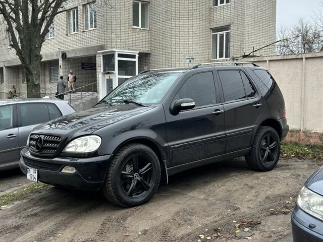 Черный Мерседес МЛ 350, объемом двигателя 3.7 л и пробегом 270 тыс. км за 8999 $, фото 8 на Automoto.ua