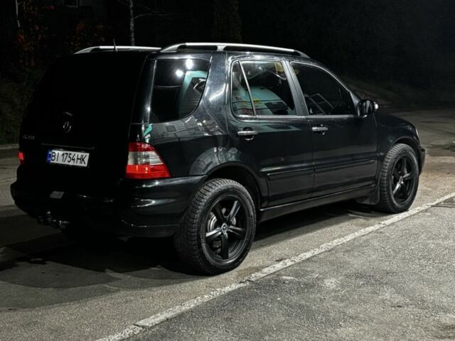 Черный Мерседес МЛ 350, объемом двигателя 3.7 л и пробегом 270 тыс. км за 8999 $, фото 4 на Automoto.ua