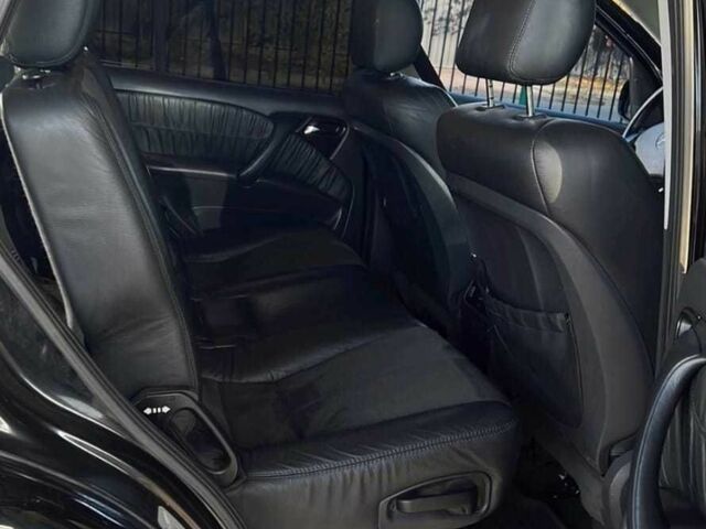 Черный Мерседес МЛ 350, объемом двигателя 3.7 л и пробегом 325 тыс. км за 5555 $, фото 17 на Automoto.ua