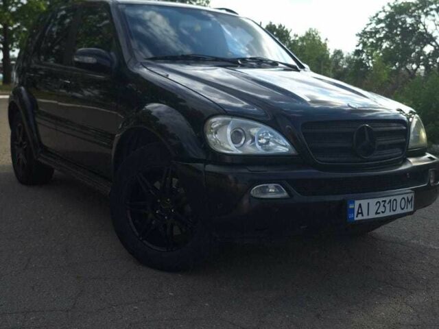 Черный Мерседес МЛ 350, объемом двигателя 3.7 л и пробегом 325 тыс. км за 5555 $, фото 9 на Automoto.ua