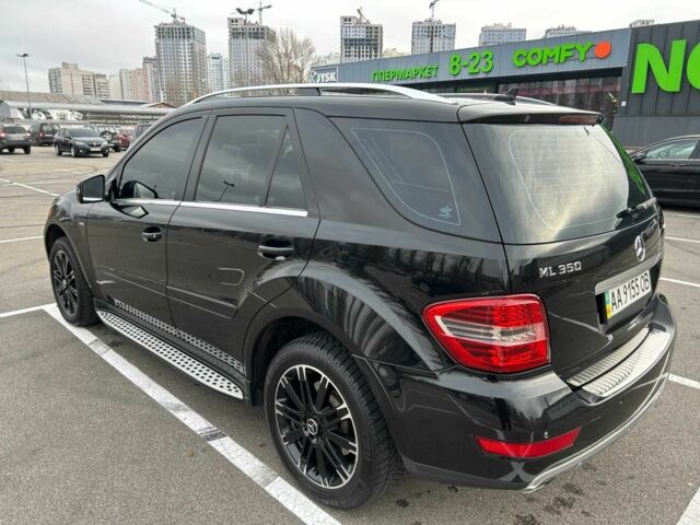 Черный Мерседес МЛ 350, объемом двигателя 3.5 л и пробегом 128 тыс. км за 15200 $, фото 1 на Automoto.ua