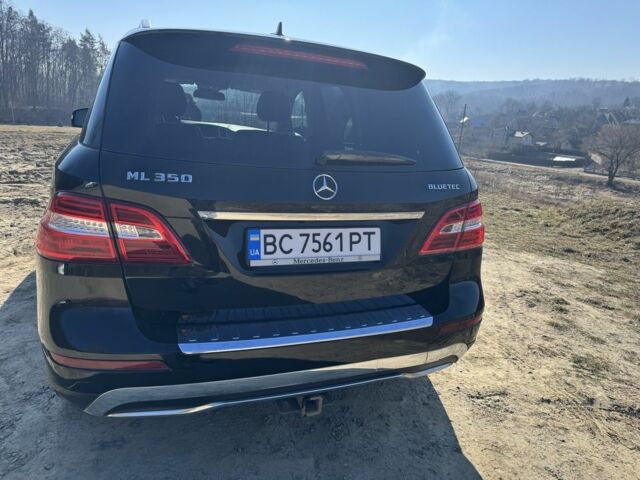 Чорний Мерседес МЛ 350, об'ємом двигуна 3 л та пробігом 231 тис. км за 20800 $, фото 4 на Automoto.ua