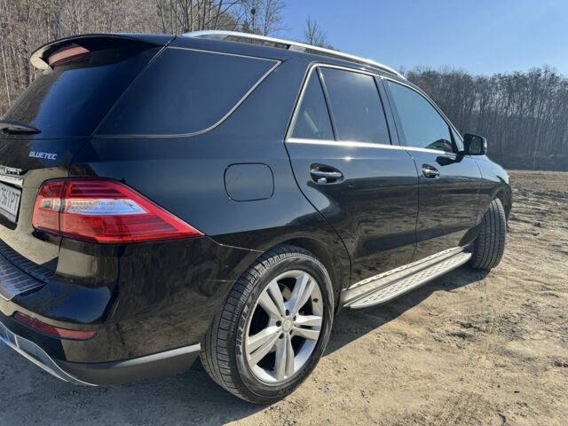 Чорний Мерседес МЛ 350, об'ємом двигуна 3 л та пробігом 231 тис. км за 20800 $, фото 3 на Automoto.ua