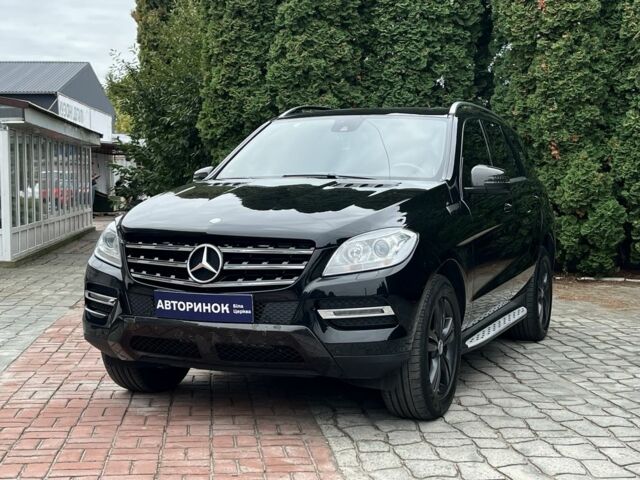 Черный Мерседес МЛ 350, объемом двигателя 3.5 л и пробегом 109 тыс. км за 19800 $, фото 7 на Automoto.ua