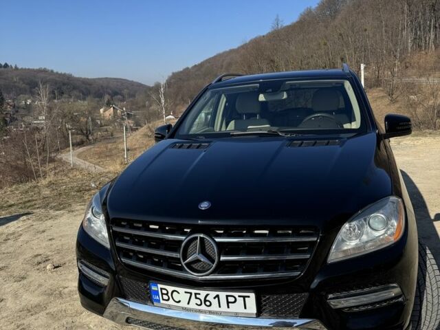 Чорний Мерседес МЛ 350, об'ємом двигуна 3 л та пробігом 231 тис. км за 20800 $, фото 1 на Automoto.ua