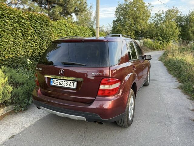 Червоний Мерседес МЛ 350, об'ємом двигуна 3.7 л та пробігом 175 тис. км за 11400 $, фото 5 на Automoto.ua