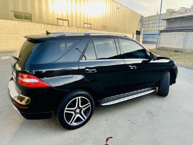 Чорний Мерседес МЛ 400, об'ємом двигуна 3 л та пробігом 157 тис. км за 25300 $, фото 2 на Automoto.ua