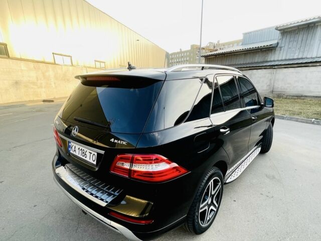 Черный Мерседес МЛ 400, объемом двигателя 3 л и пробегом 157 тыс. км за 25300 $, фото 14 на Automoto.ua