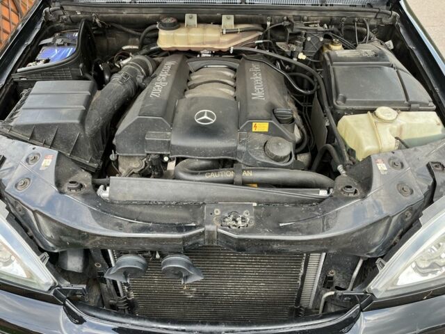 Черный Мерседес МЛ 500, объемом двигателя 5 л и пробегом 378 тыс. км за 7100 $, фото 15 на Automoto.ua