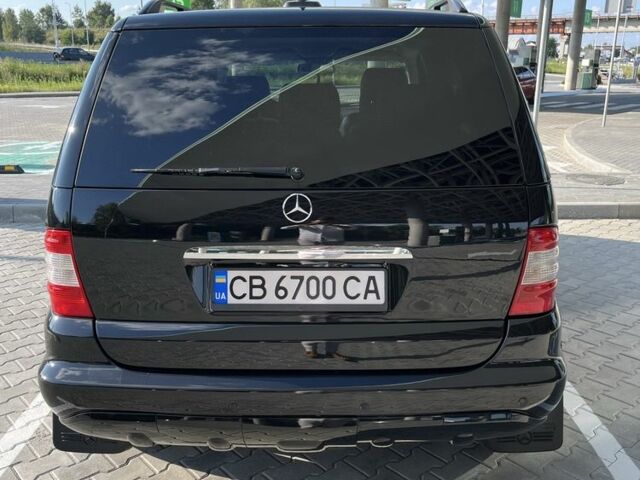 Черный Мерседес МЛ 500, объемом двигателя 5 л и пробегом 378 тыс. км за 7100 $, фото 5 на Automoto.ua